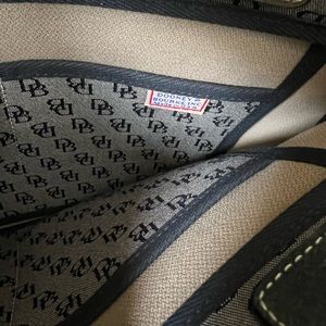 Dooney & Bourke navy blue cloth Perfect condition